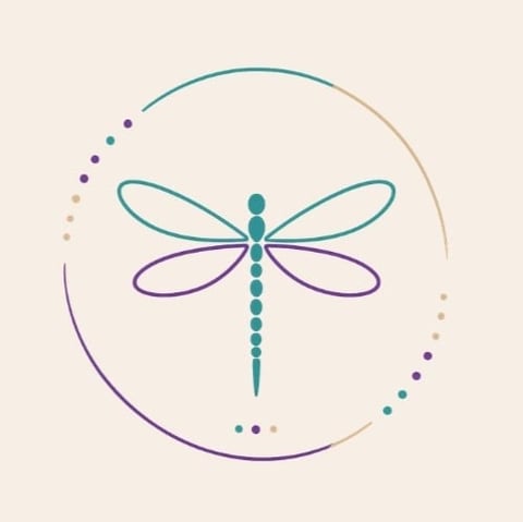 Stylized dragonfly with teal and purple wings centered in a circular design with decorative dots